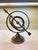 Vintage Metal Armillary Sphere With Arrow Tabletop Sculpture Globe Office Decor Classic old world celestial decor in a...