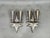 Rare pair of cubist wall lights produced in czechoslovakia during the 1920s featuring exceptional geometric star-shaped...