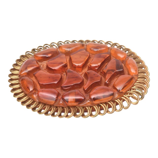 Art Deco Orange Amber Brown Bakelite and Looped Brass Carved Oval Pin Brooch For Sale