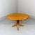 Very stylish oval table in blond ashwood, Denmark. Nice wood joints in the legs. Because of the height and shape it is...