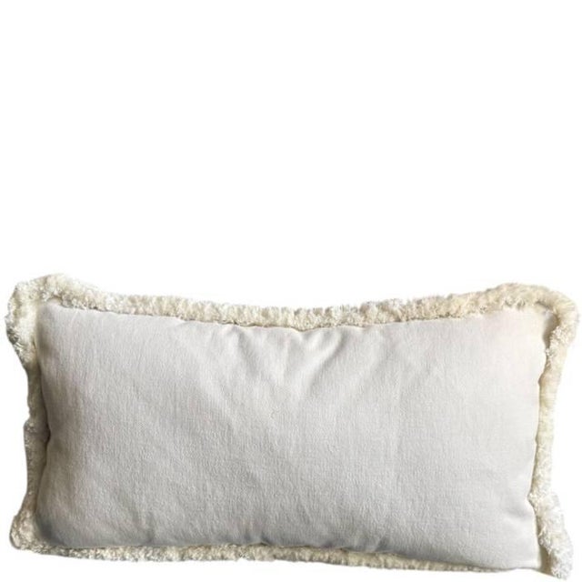 A pillow in our signature style pattern, made with a multicolor stripe from Pierre Frey in a fresh cotton blend. Backed...