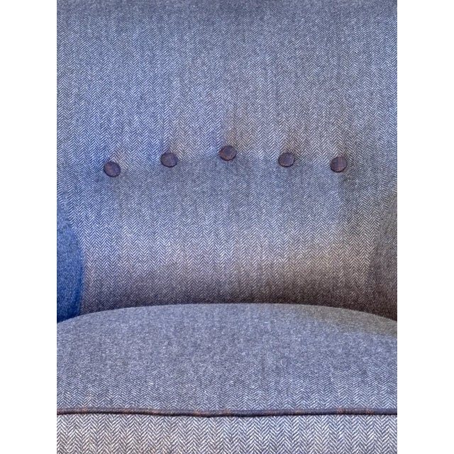 "This refined pair of armchairs, with an ancient and timeless structure, has been expertly reupholstered with fine Pray...