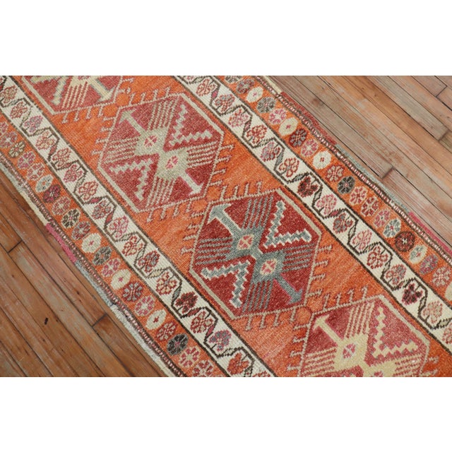 Mid 20th century Long geometric turkish runner in orange