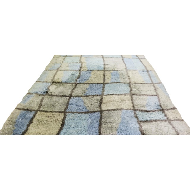 Moroccan Azilal hand knotted rug with natural colors, contemporary style and soft texture.