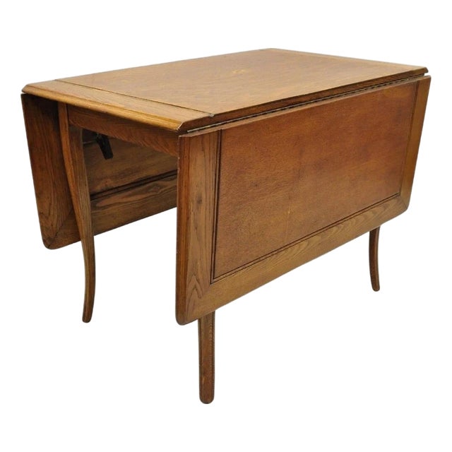 Vintage Mid Century Modern Klismos Saber Leg Oak Wood Drop Leaf Dining Table For Sale