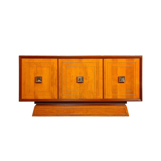 This stunningly bold and sophisticated Mid-Century Modernist Bar Cabinet in Bookmatched Walnut with Inset Antiqued...