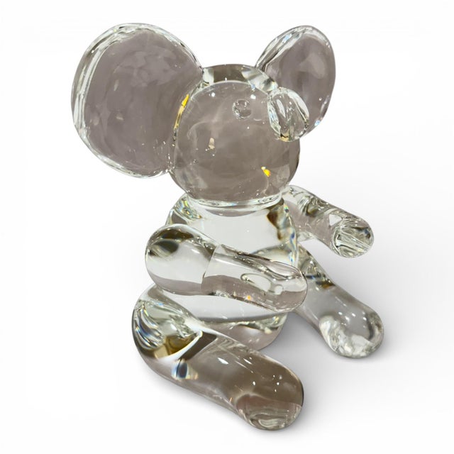 An exquisite Steuben crystal koala bear sculpture, beautifully rendered in clear, hand-blown art glass with subtle satin...