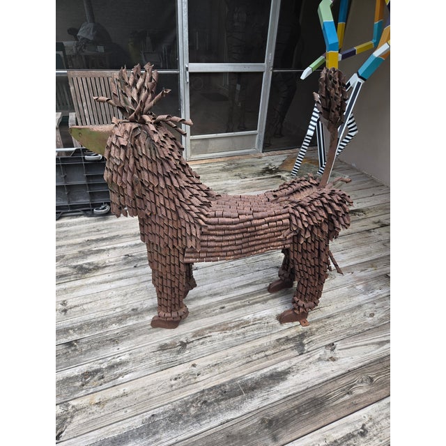 Keith Bradley Poodle Metal Sculpture Unsigned sold as found with oxidation to cut steel without overt damage..