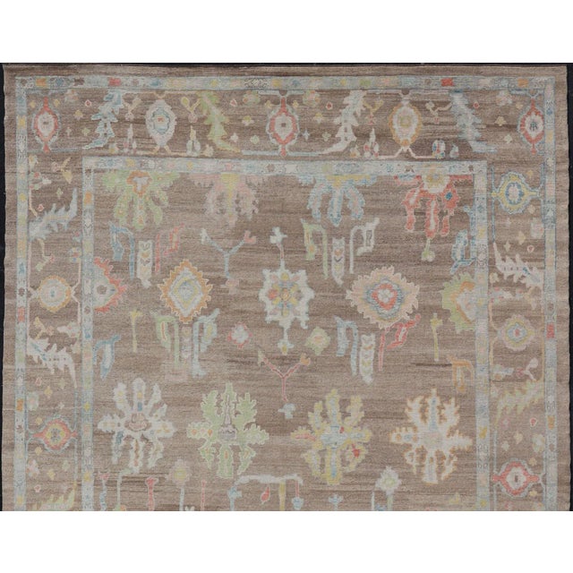 Measures: 13'4 x 17'6 Specially made with hand spun and old wool combination Turkish Oushak Rug with All-Over Floral...