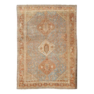 Antique Persian Shiraz Rug Featuring Tribal Medallion Motifs in Soft Terra Cotta For Sale