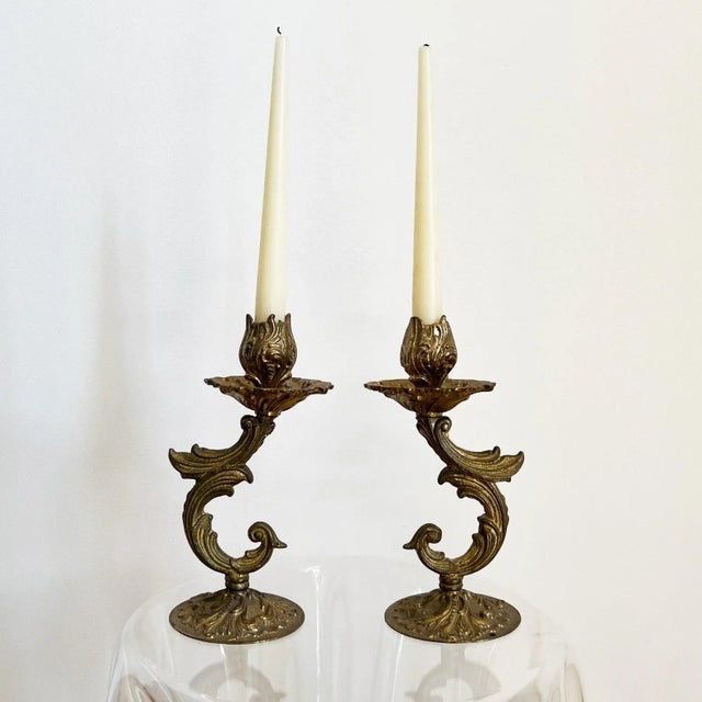A pair of beautiful antique rococo style candlestick holders, probably originally used as lamp bases