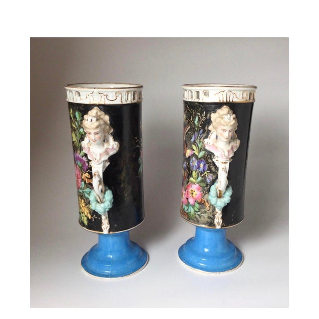Pierced and reticulated rim outlined in burnished gold leaf. Hand painted enamels of tropical style birds and vibrant...