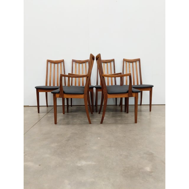 Set of 6 authentic vintage mid century modern dining chairs. 2 armchairs and 4 side chairs. Designed by Leslie Dandy for G...