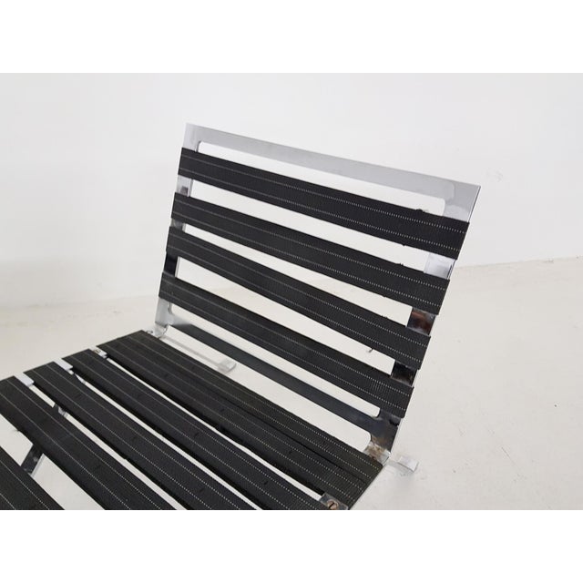 Set of 2 lounge chairs model Euro 1600 by Hans Eichenberger for Girsberger Reupholstered in black leather, new cushions....