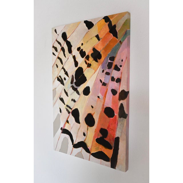 Hayley uses butterfly and moth wings as inspiration for her abstract earthy paintings.