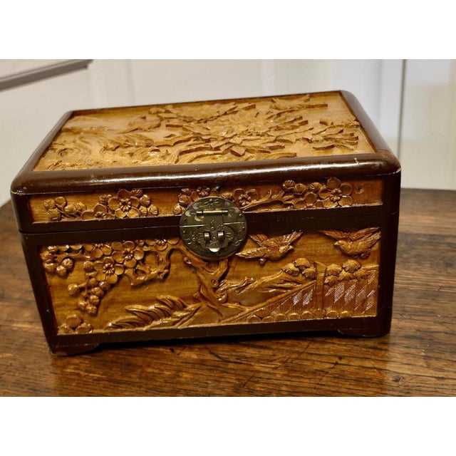 Oriental carved camphor wood chest. This Beautiful Carved Chest is made from Camphor Wood, for those of you who do not...
