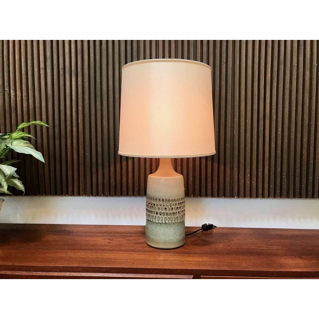 This glazed ceramic table lamp was hand-crafted at the Søholm Stentøj workshop on the Danish island of Bornholm during the...