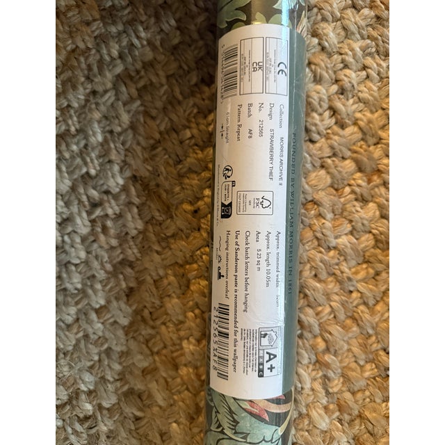 Six new, wrapped rolls of William Morris Strawberry Thief in Chocolate/Slate. Purchased from Wallpaper Direct. Additional...