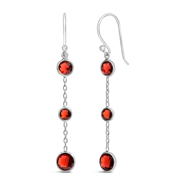 Immerse yourself in the splendor of these exquisitely crafted dangle earrings, featuring a trio of richly hued,...