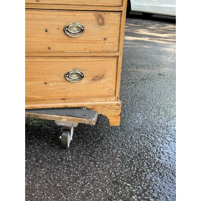 This is a lovely antique pine chest! This piece dates to the 19th century and has lovely patina. The wood has a warm glow,...