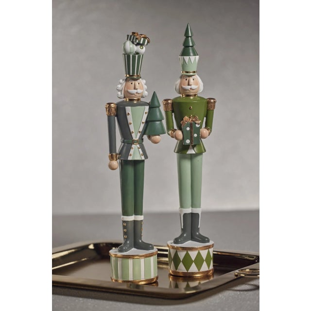 Add some elegance to your holiday decor with this beautiful Christmas nutcracker tabletop decor. This regal nutcracker...