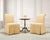 An organic modern pair of scrolled and skirted slipper chairs crafted from woven raffia grasscloth. The chairs feature a...