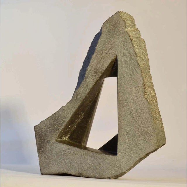 Abstract sculpture hand formed granite by the Dutch artist J. Metaho, made in the 1970s. The polished slice of granite is...