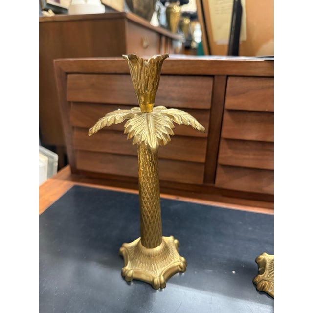 A fantastic pair of polished brass candle stick holders with clean, pretty lines. Hollywood regency, Palm Beach Chic. Made...