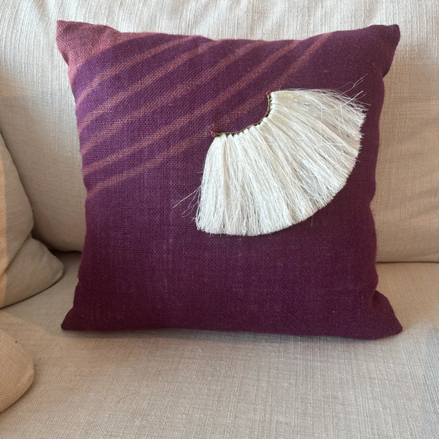 Charlie Sprout throw pillow. 16 x 16 hand painted burlap in purple and rose. Sisal fan embellishment. Hand crafted with...