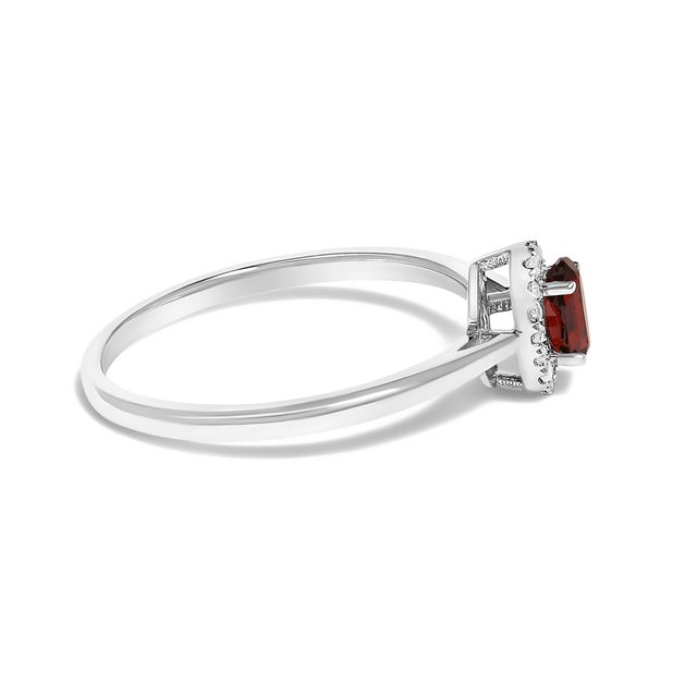 Contemporary 10K White Gold 5X3MM Oval Red Garnet and Diamond Accent Halo Ring (I-J Color, I1-I2 Clarity) - Ring Size 8 For Sale - Image 3 of 7