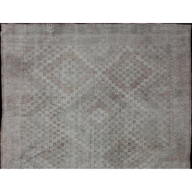 Embroidered vintage Kilim rug from Turkey in shades of tan, taupe, cream, and light blue with geometric pattern, Keivan...