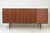Highboard by Henry Rosengren Hansen for Brande Møbelindustri, Denmark, 1960s A very rare, long highboard with sliding...