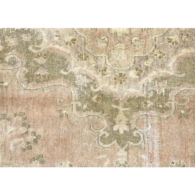 1960s Turkish Oushak Rug. Handwoven with wool on wool foundation in the Oushak region of Western Turkey. The Anatolian...