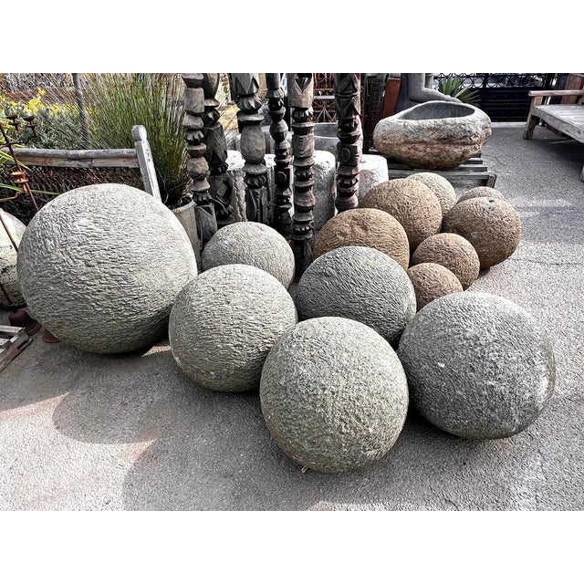 Rustic stone garden sphere hand-carved from granite. Each slightly unique in natural textures, tones and patina. A...