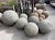 Rustic stone vintage garden sphere hand-carved from granite. Each slightly unique in natural textures, tones and patina. A...