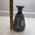 Bring timeless neoclassical beauty into your home with this vintage Wedgwood Blue Jasperware bud vase. this elegant piece...