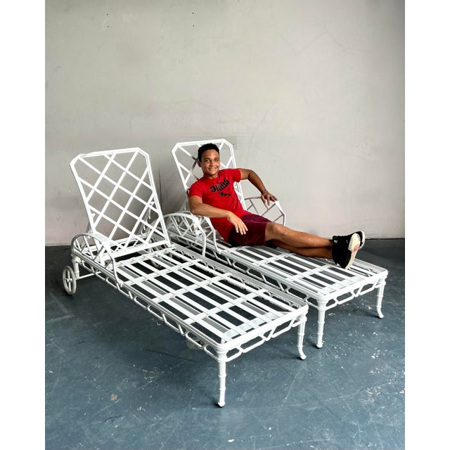 Indulge in sophisticated outdoor leisure with this exceptional pair of Vintage Regency Brown Jordan "Calcutta" Cast...