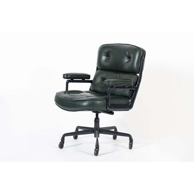 This vintage mid century modern green Model 3475 Eames Time Life Lobby Chair designed by Charles & Ray Eames for Herman...