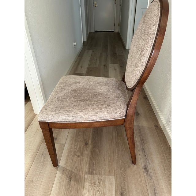 Custom desk chair by Bernhardt Furniture upholstered in Heather taupe fabric.