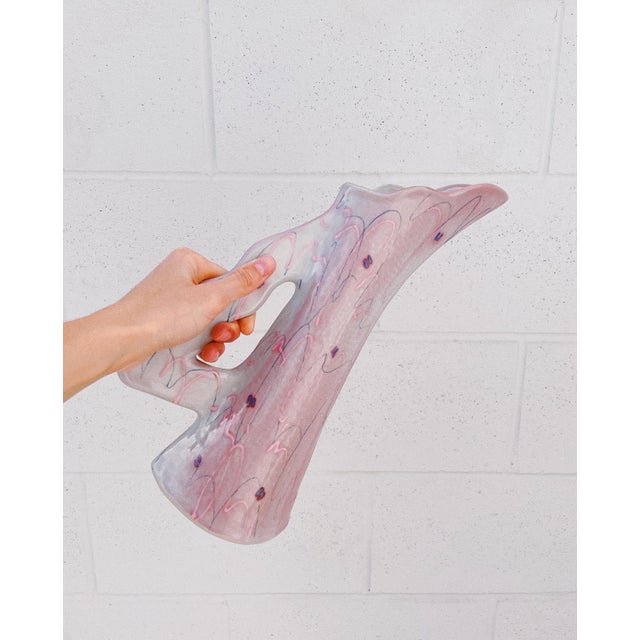 1980s Ceramic Sculptural Vase by Ingrid, signed. A stunning speckled pink and blue-gray glazed ceramic vase with a soft,...