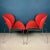 Add a touch of hot red to your home with this stunning pair of chairs, inspired by Pierre Paulin's original 1960s design,...