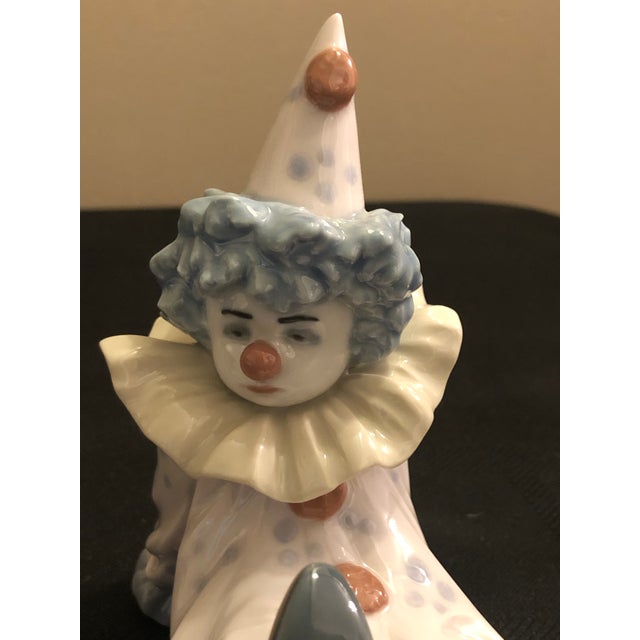 A charming and nostalgic vintage porcelain sculpture from renowned Spanish porcelain house Lladró. Titled "Tired Friend"...