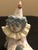 A charming and nostalgic vintage porcelain sculpture from renowned Spanish porcelain house Lladró. Titled "Tired Friend"...