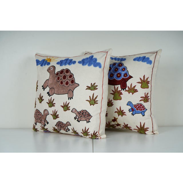 Uzbek Suzani Pillow Cover Elevate your home decor with our Turkish Suzani Pillow Cover, featuring exquisite vintage Uzbek...