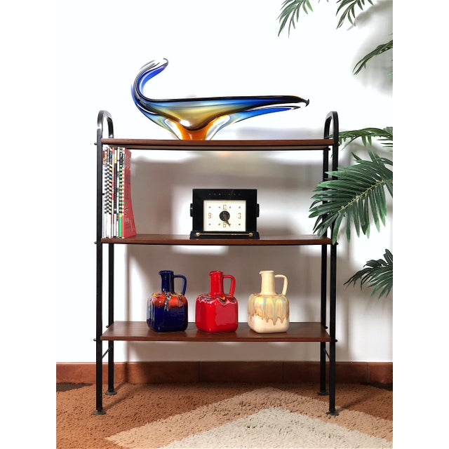 Vintage 1960s 3-shelf cabinet - Made in Italy - The cabinet features a metal frame, three teak veneer shelves, and...