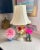 Darling 1950s/60s Italian tole table or desk lamp featuring a colorful bouquet of flowers wrapped in a triple looped bow...