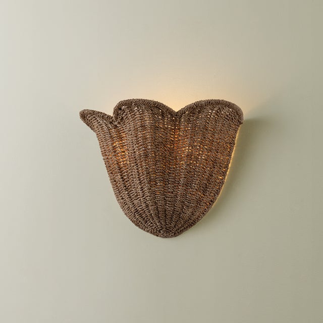 The Ardonia family pairs two trending design elements, scallops and naturals. Woven tightly from abaca fibers, the upward-...
