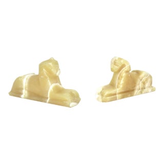 Pair of Vintage Carved Alabaster Sphinx Shelf or Coffee Table Styling Onyx Bookends For Sale