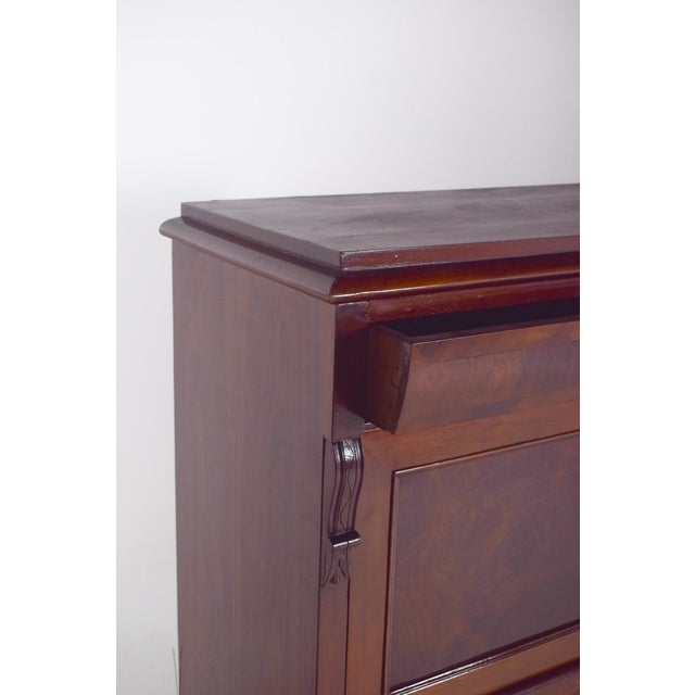 Abattant cabinet with three large drawers. with a hinged top, characteristic of 19th century European furniture. Made from...