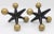 A stunning pair of Mid Century Modern Black and Gold Jacks. Very cool gift/ office decor. The dimensions listed are for...